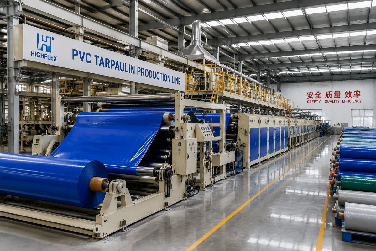 PVC tarpaulin production line running in a factory warehouse